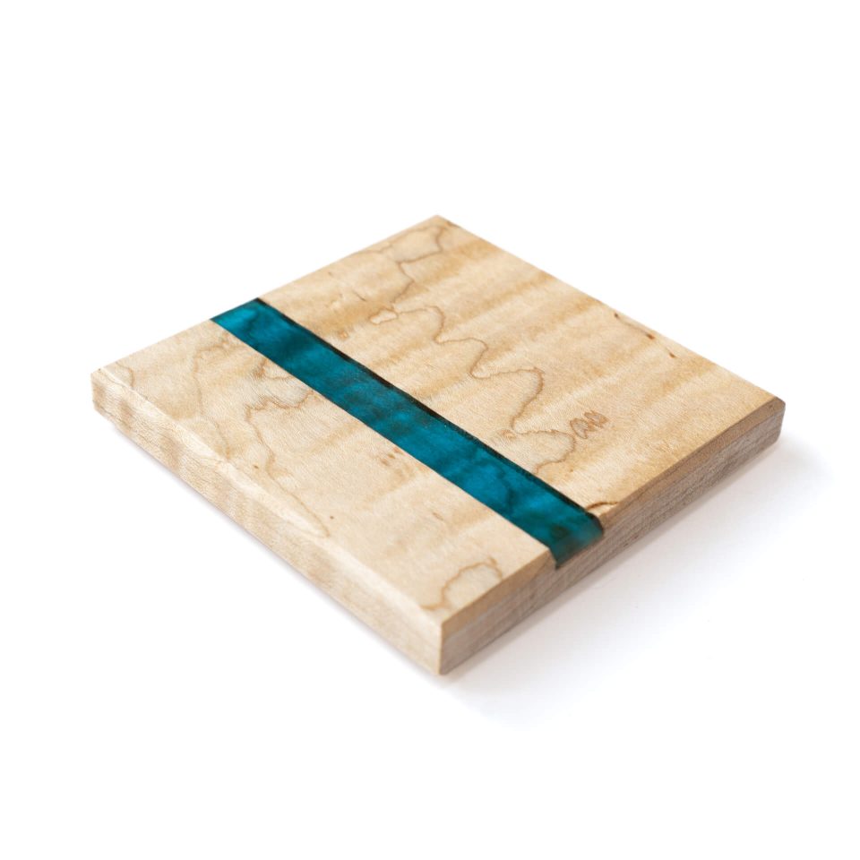 Wood with blue resin inlay coasters individual view by Unicity Woodworking